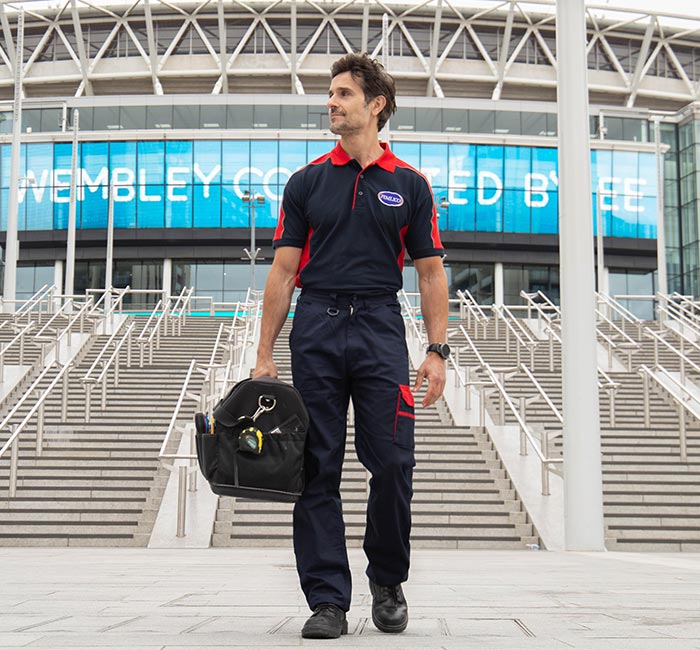 Pimlico engineers walking near the Wembley Stadium