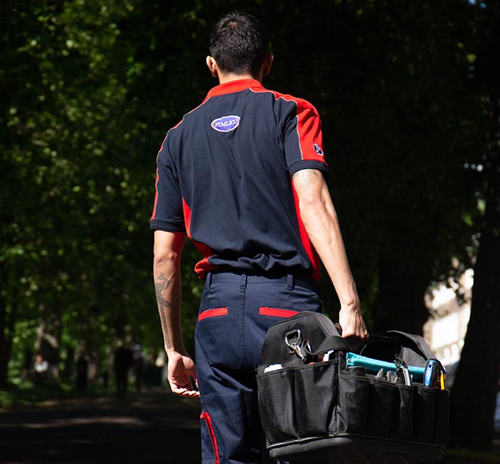 Pimlico engineer walking down a street in Hillingdon