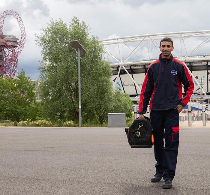 Pimlico engineer standing by the Olympic Stadium in Newham