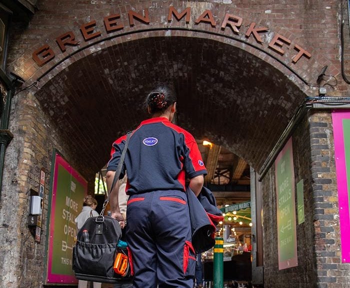 Pimlico engineer walking by Borough Market in Southwark