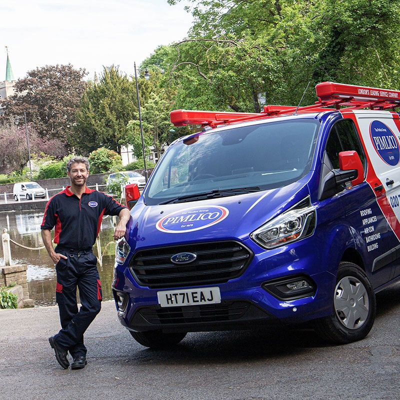 Pimlico engineer by his van in Sutton