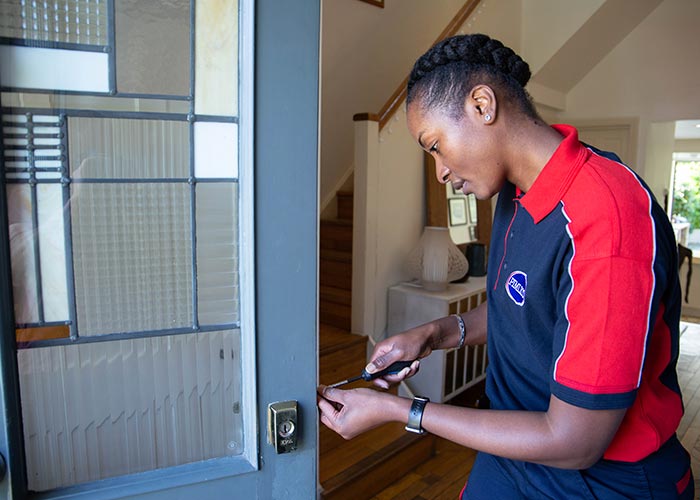 Pimlico builder fixing door