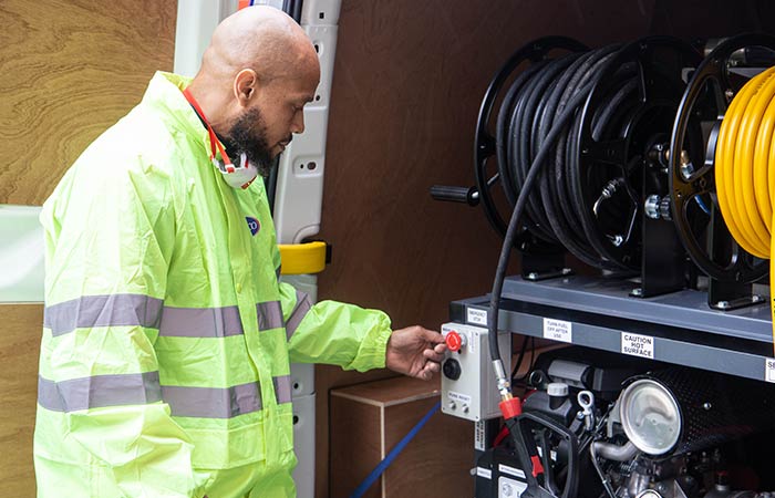 Pimlico drainage engineer at his van