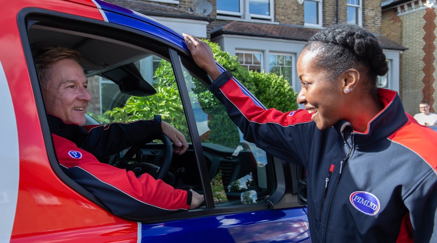 Two Pimlico engineers chat to one another below leaving a job site