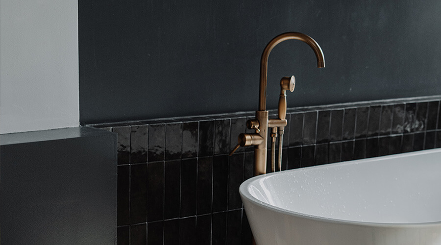 Gothic black and copper style bathroom