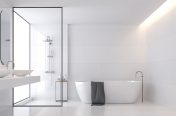 minimal white bathroom with white tub