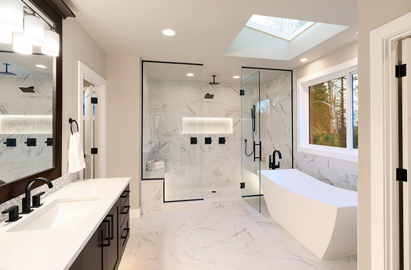 transitional bathroom with large windows