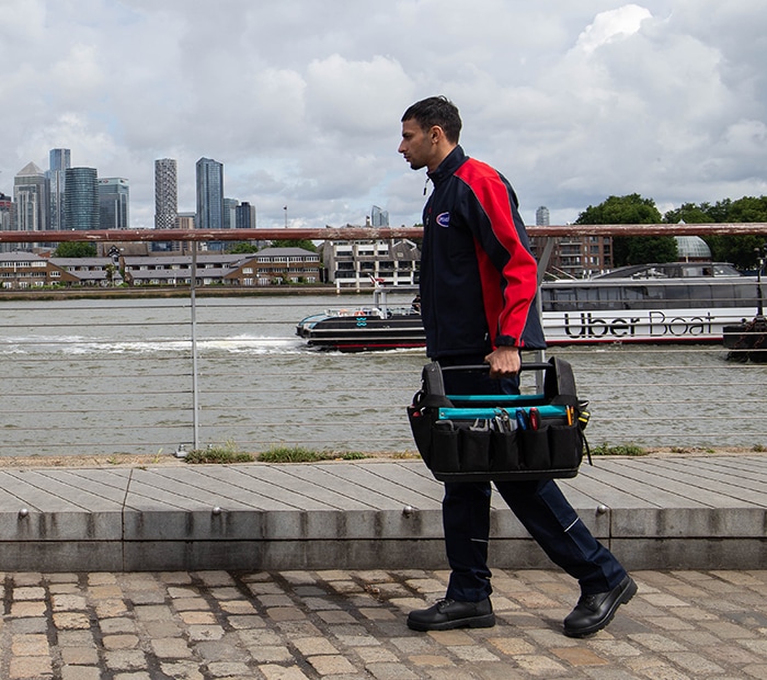 Pimlico engineer walking along the Thames in Greenwich