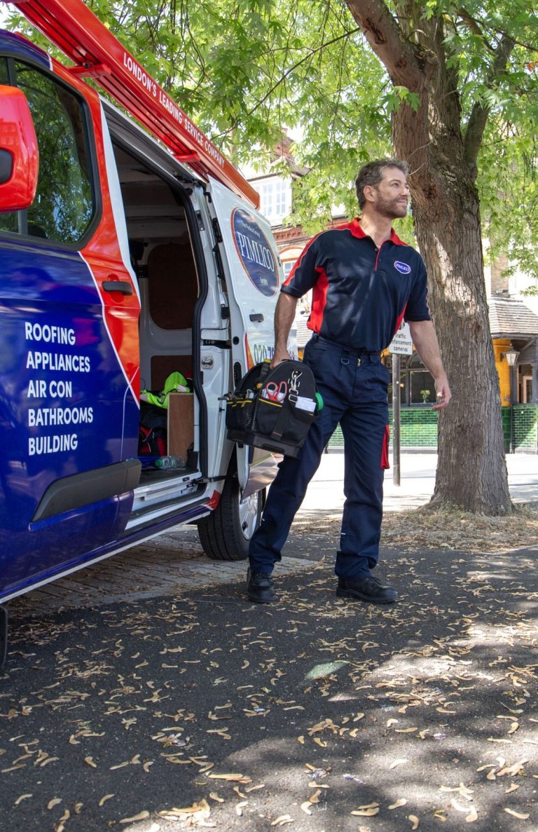 Pimlico Heating Engineer Stood by Van