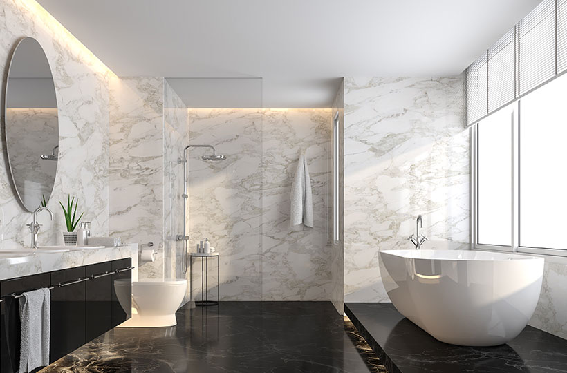 contemporary bathroom with large oval mirrors