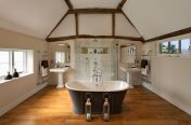 traditional bathroom with roll top bath