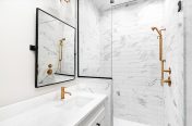 White bathroom with slightly textured tiles