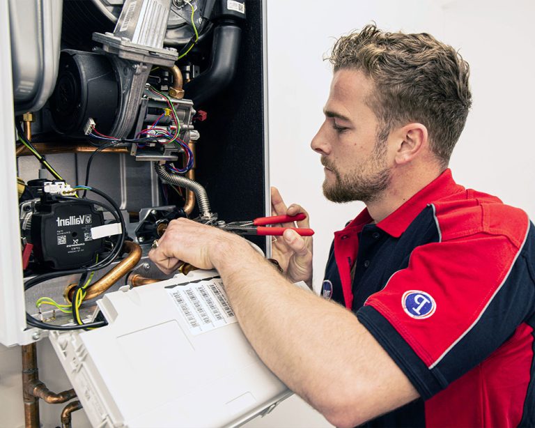 Pimlico boiler engineer repairing boiler