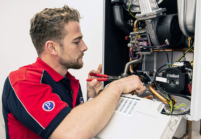 pimlico heating engineer repairing boiler