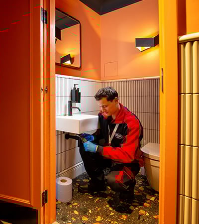 Pimlico plumber fixing a sink