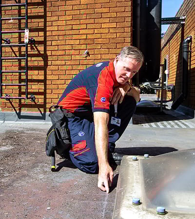 Pimlico roofer checking a sky light