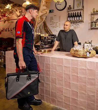 Pimlico engineer talking to a small business owner