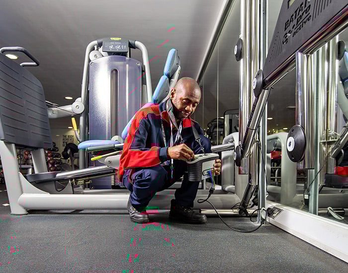 Pimlico electrician using an circuit tester