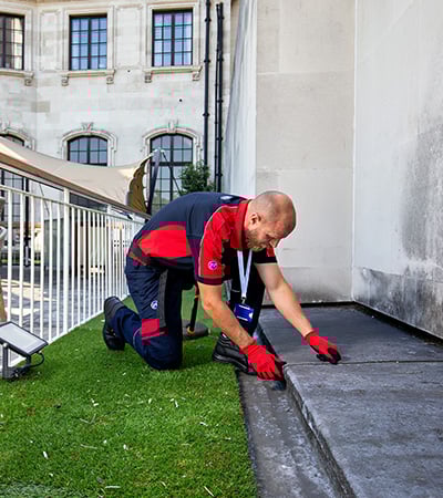 Pimlico roofer checking a flat roof