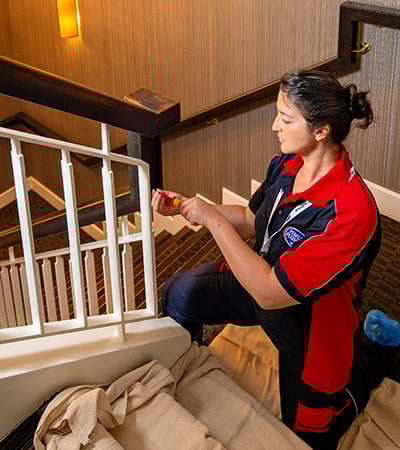 Pimlico carpenter working on a banister