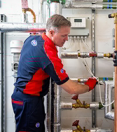 Pimlico heating engineer working on heating system