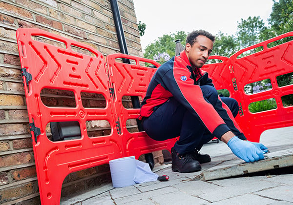 Drainage expert lifting slab to review external drains