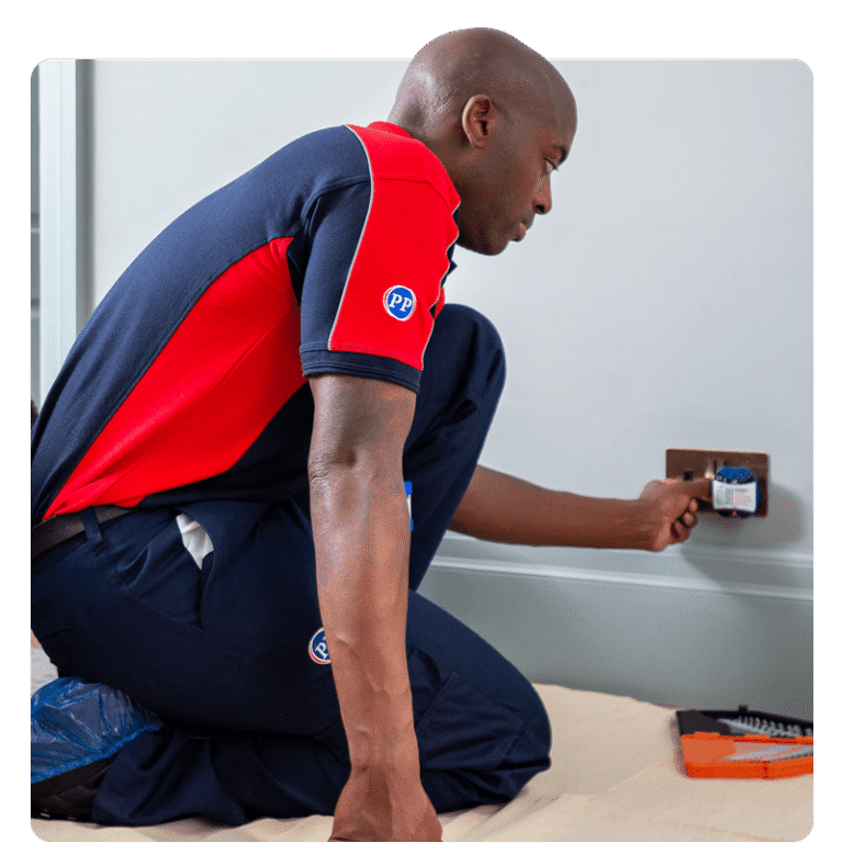 Pimlico electrician testing a plug socket