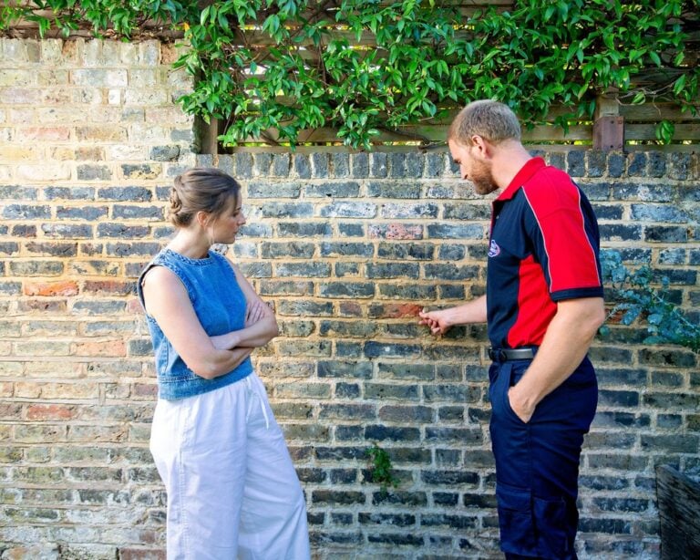 Wall inspection for a building maintenance service