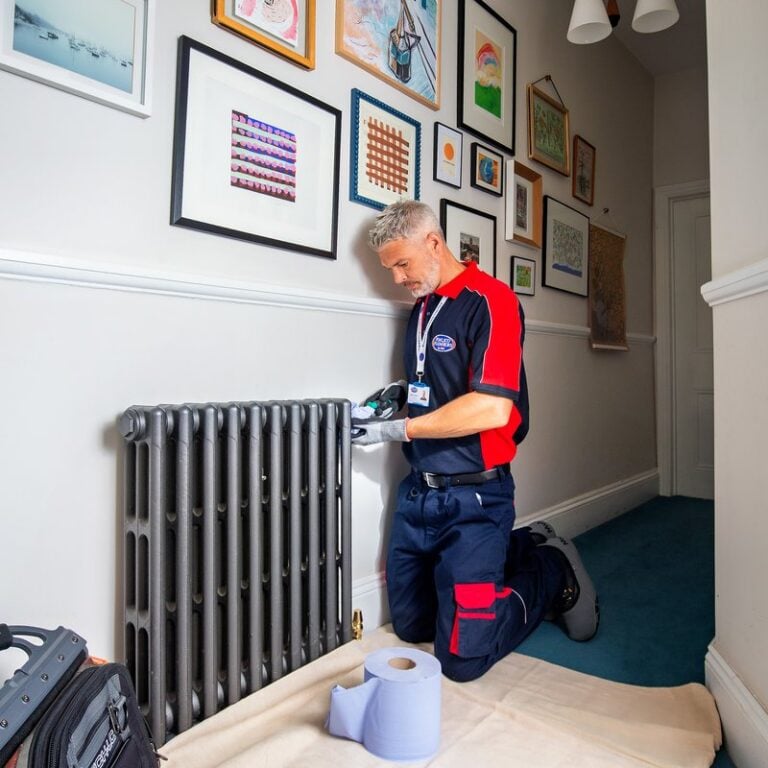 Man doing maintenance on central heating