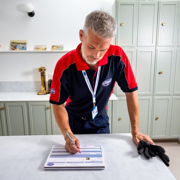 Man recording safety checks