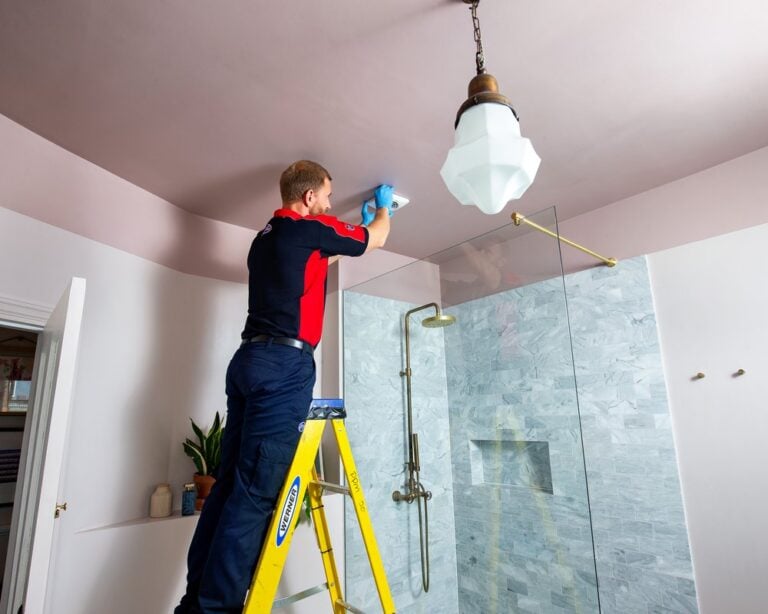 Man inspecting fan